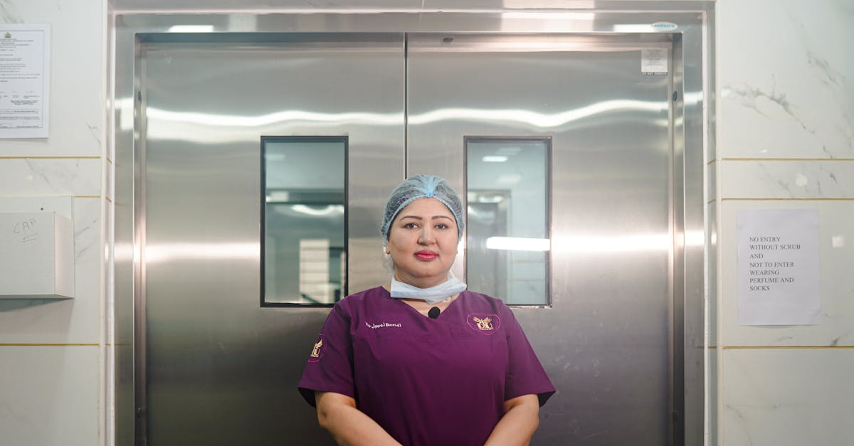 Healthcare professional in a fertility clinic corridor