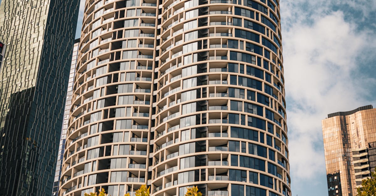 Modern high-rise buildings in Melbourne's skyline viewed from an apartment window