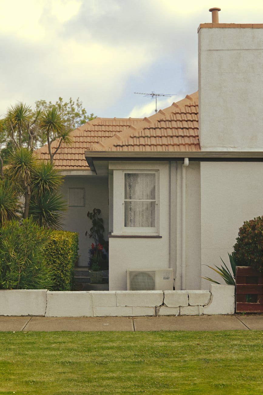 Suburban Australian house facade in Geelong with manicured front garden and tiled roof