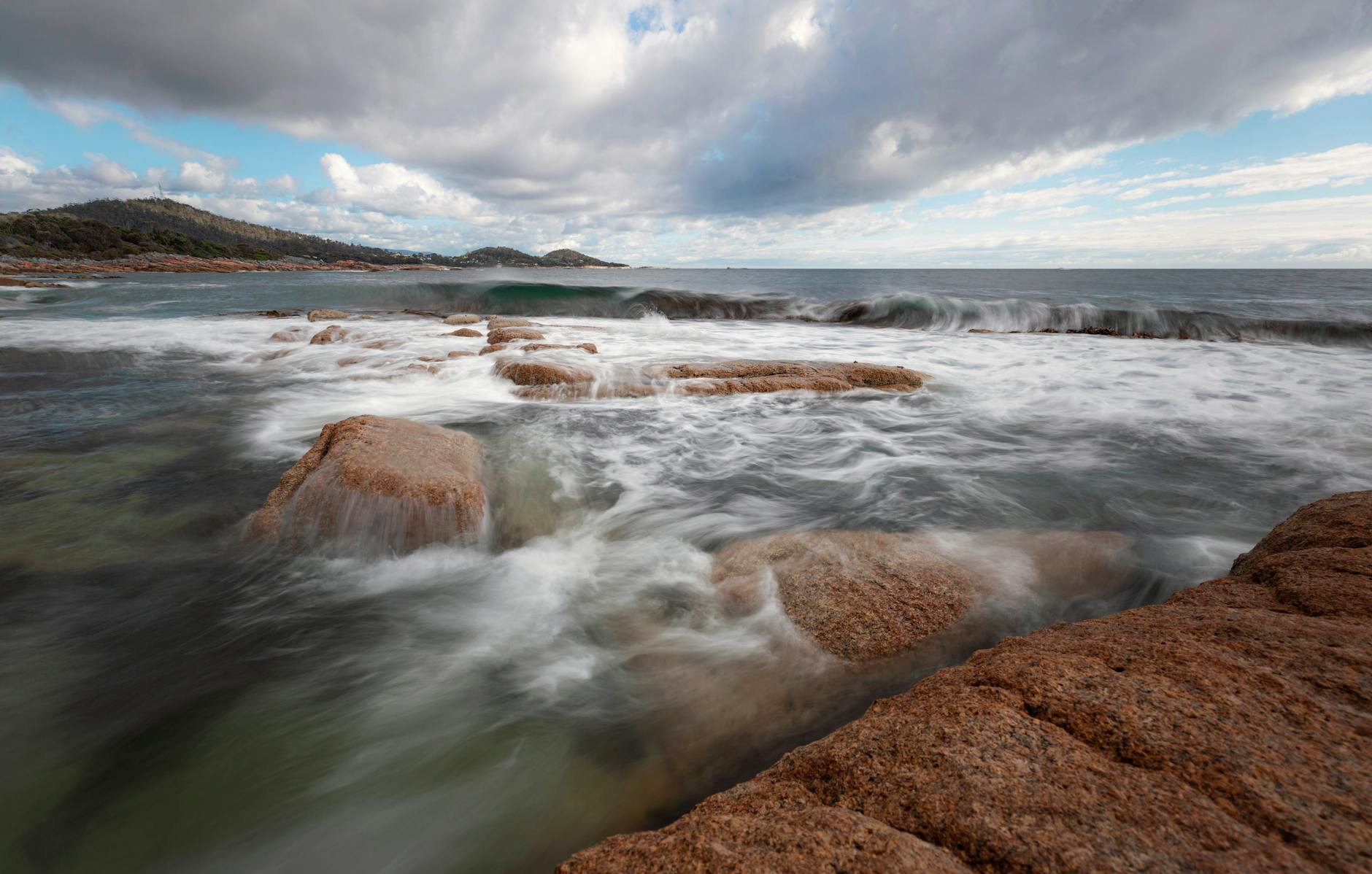 Long-exposure rocky coastal waves at Bicheno on Tasmania's east coast