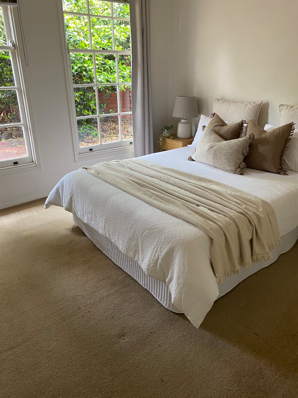 A cosy bedroom with layered bedding for winter