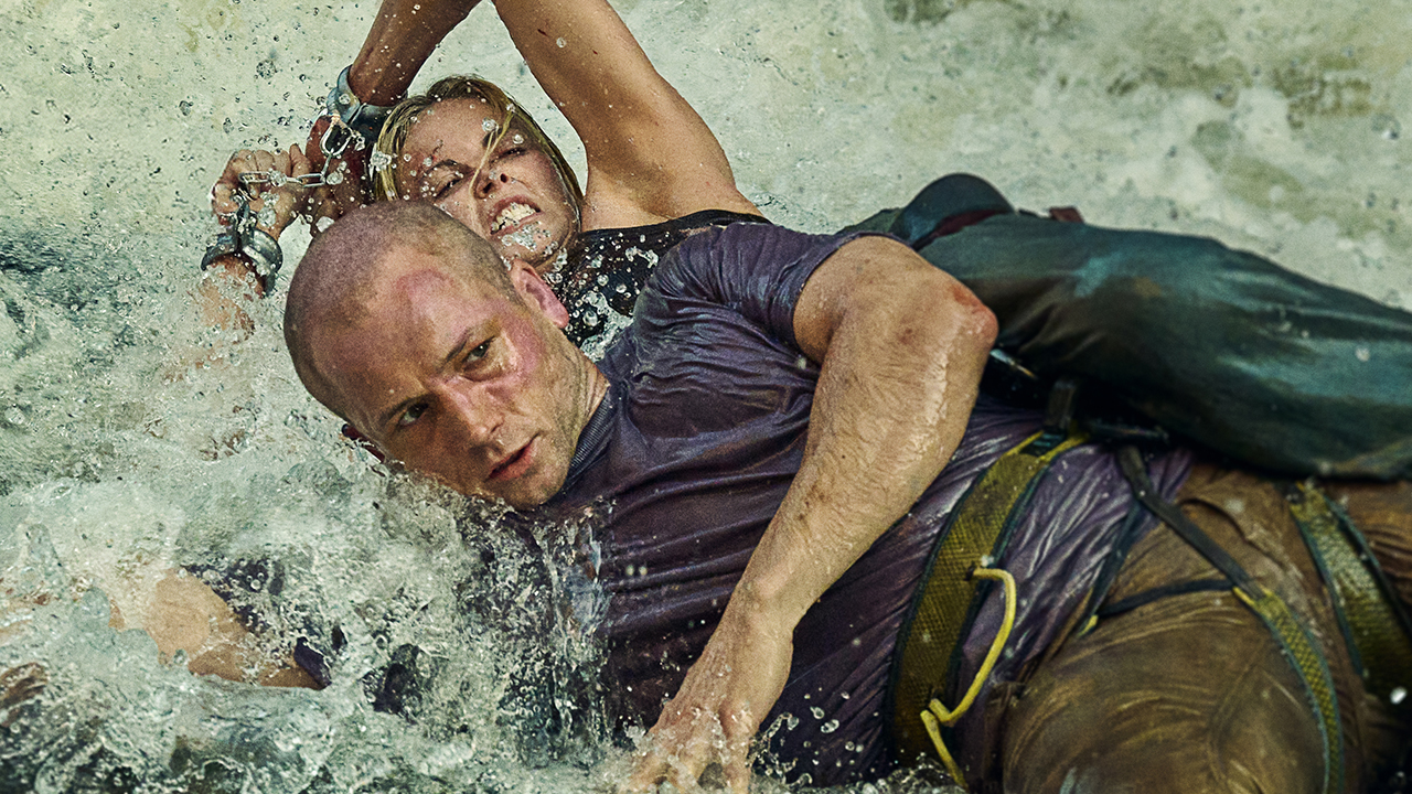 First-look still from Netflix thriller Apex featuring Charlize Theron and Taron Egerton