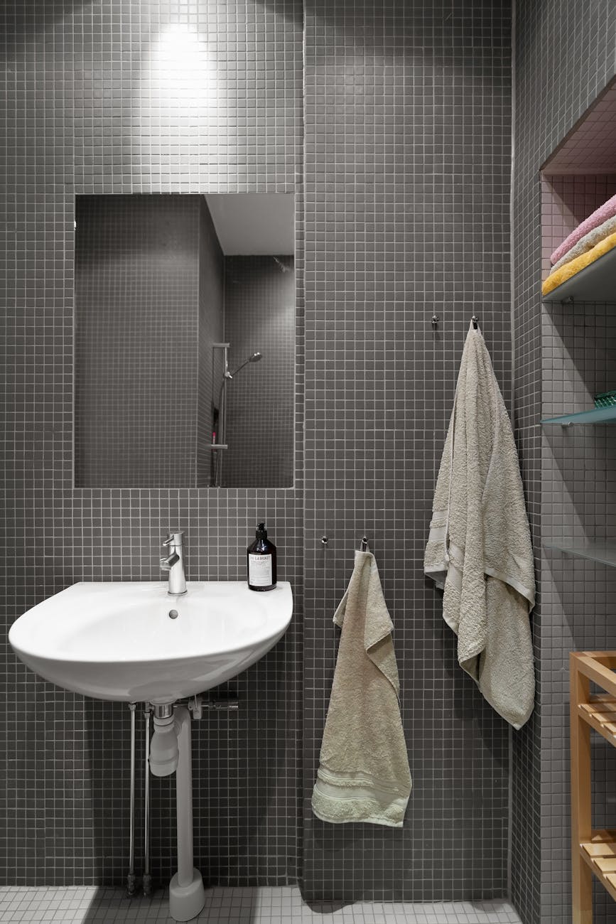 A small, neatly styled bathroom