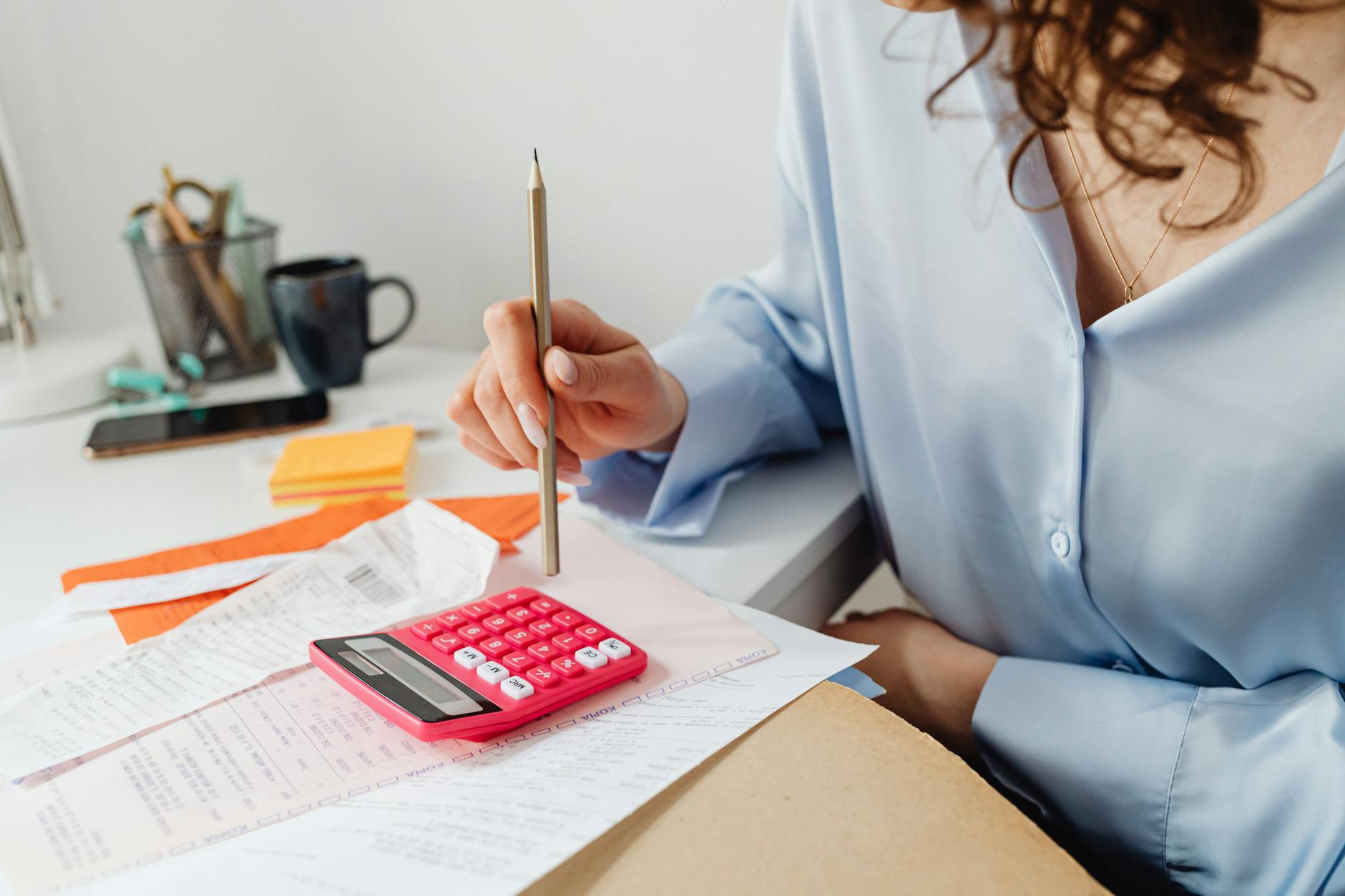 Payroll and superannuation paperwork on a desk