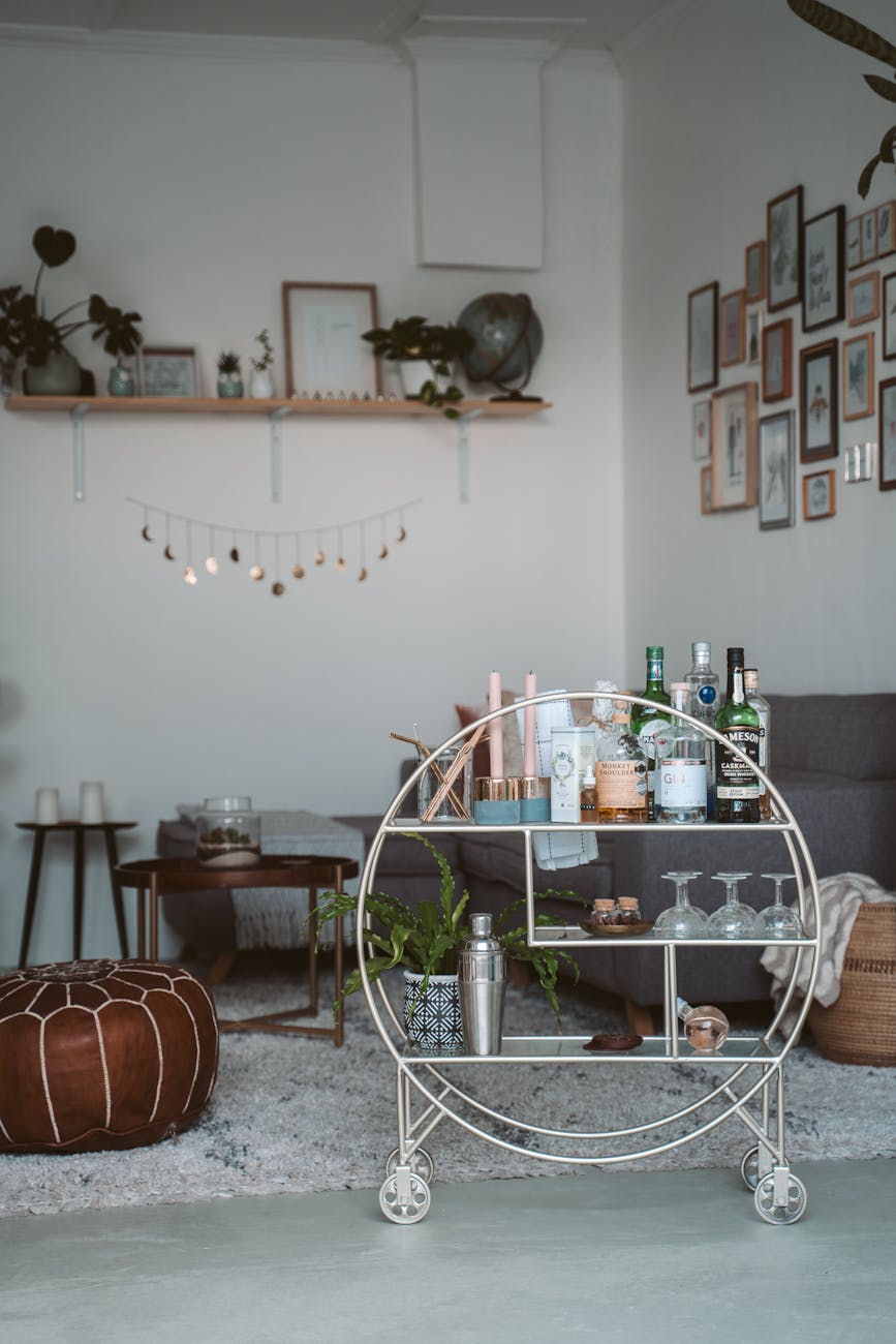 Brass bar cart styled in a living room for evening drinks