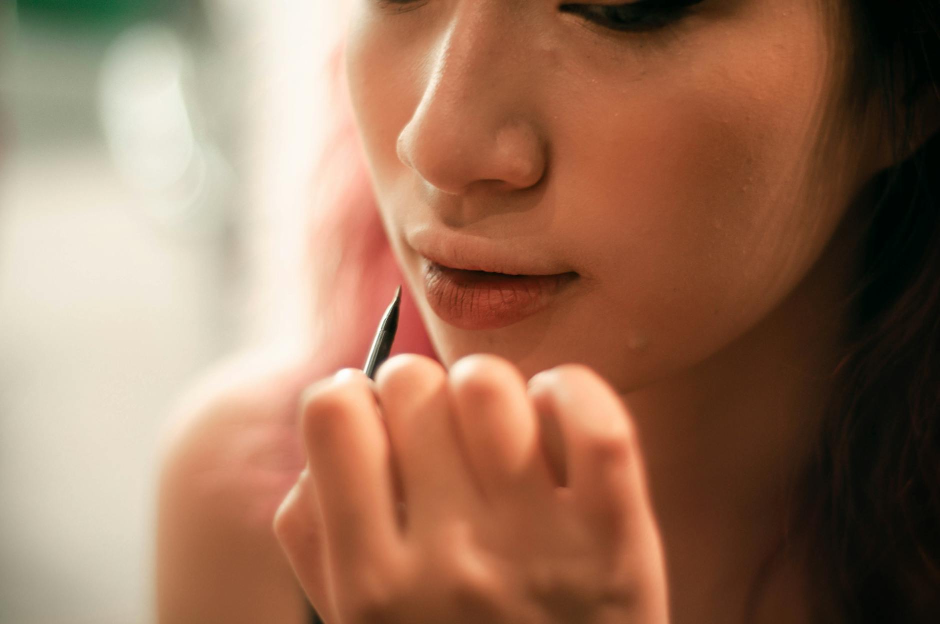 Peptide lip liner and glossy lips close-up
