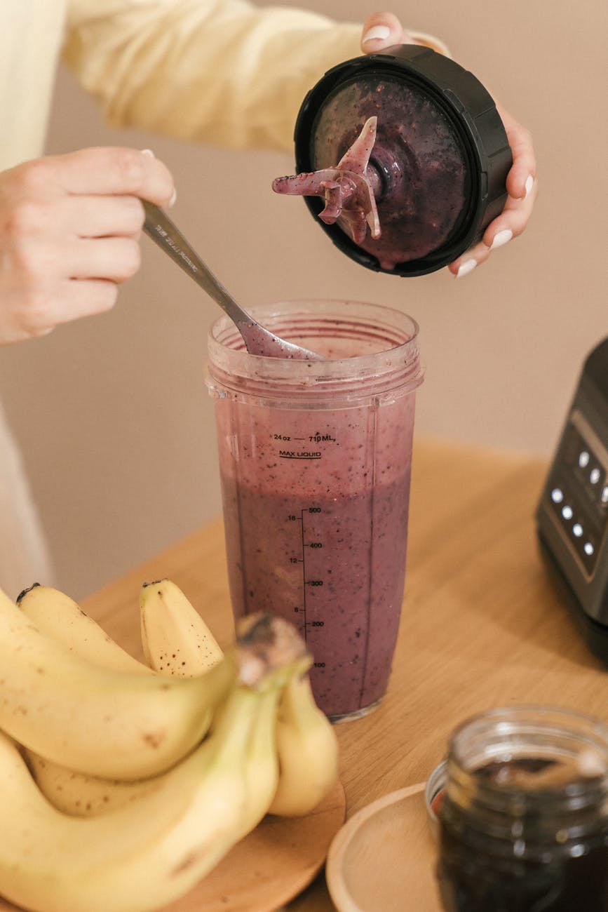 Berry smoothie ingredients on a kitchen bench