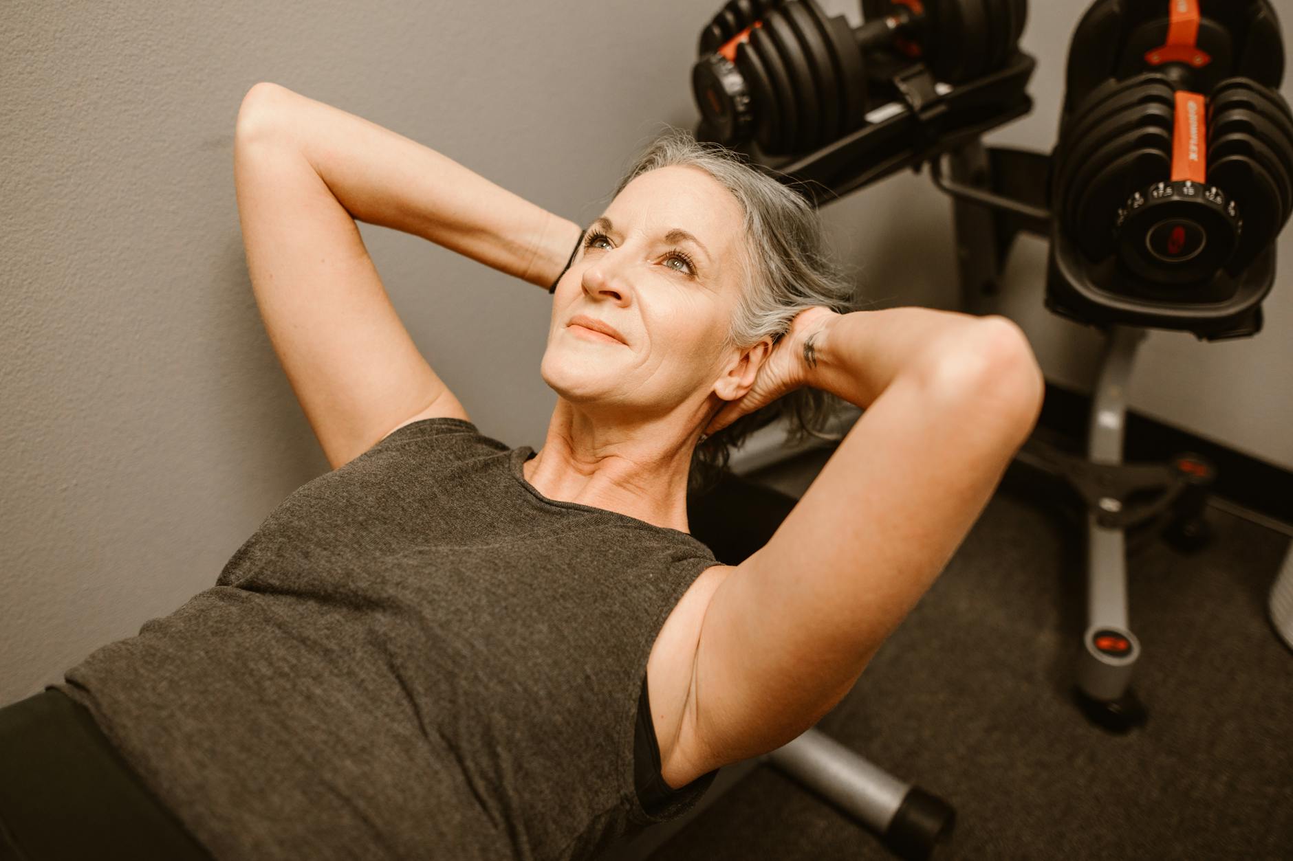 Woman mid-workout, used to illustrate creatine's move from sports supplement to menopause wellness trend