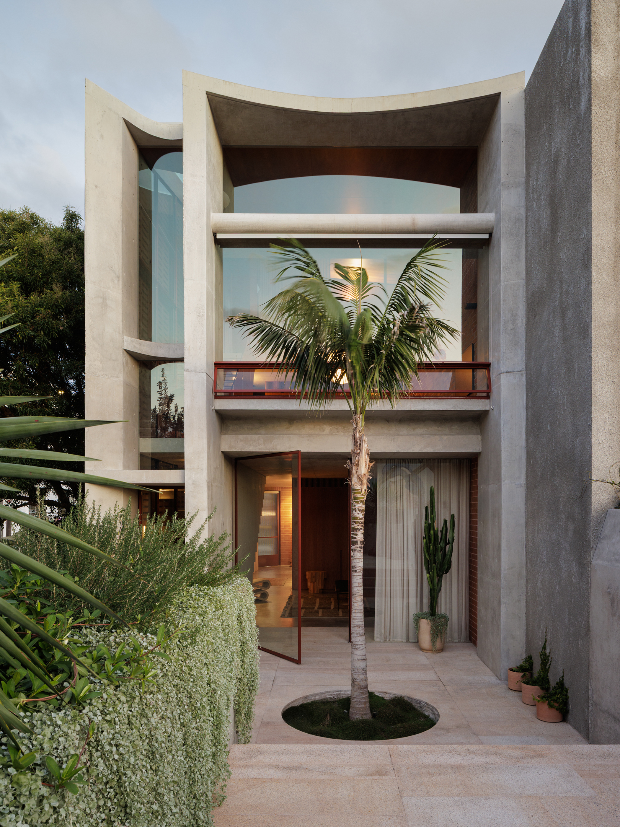 Converted Sydney corner shop with retained street-facing facade and contemporary living space behind
