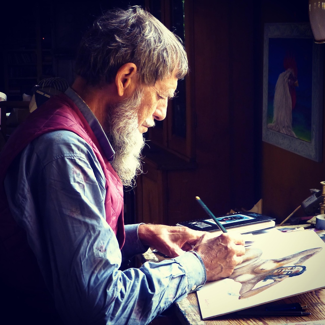 An older painter at work in the studio, a more grounded image for a story about the suffering-artist myth.