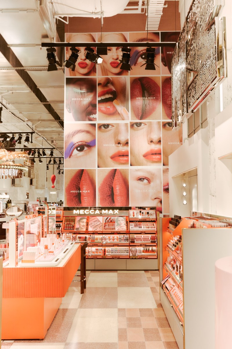 Interior of Mecca's Bourke Street flagship in Melbourne with consultation counters and multi-level beauty displays.