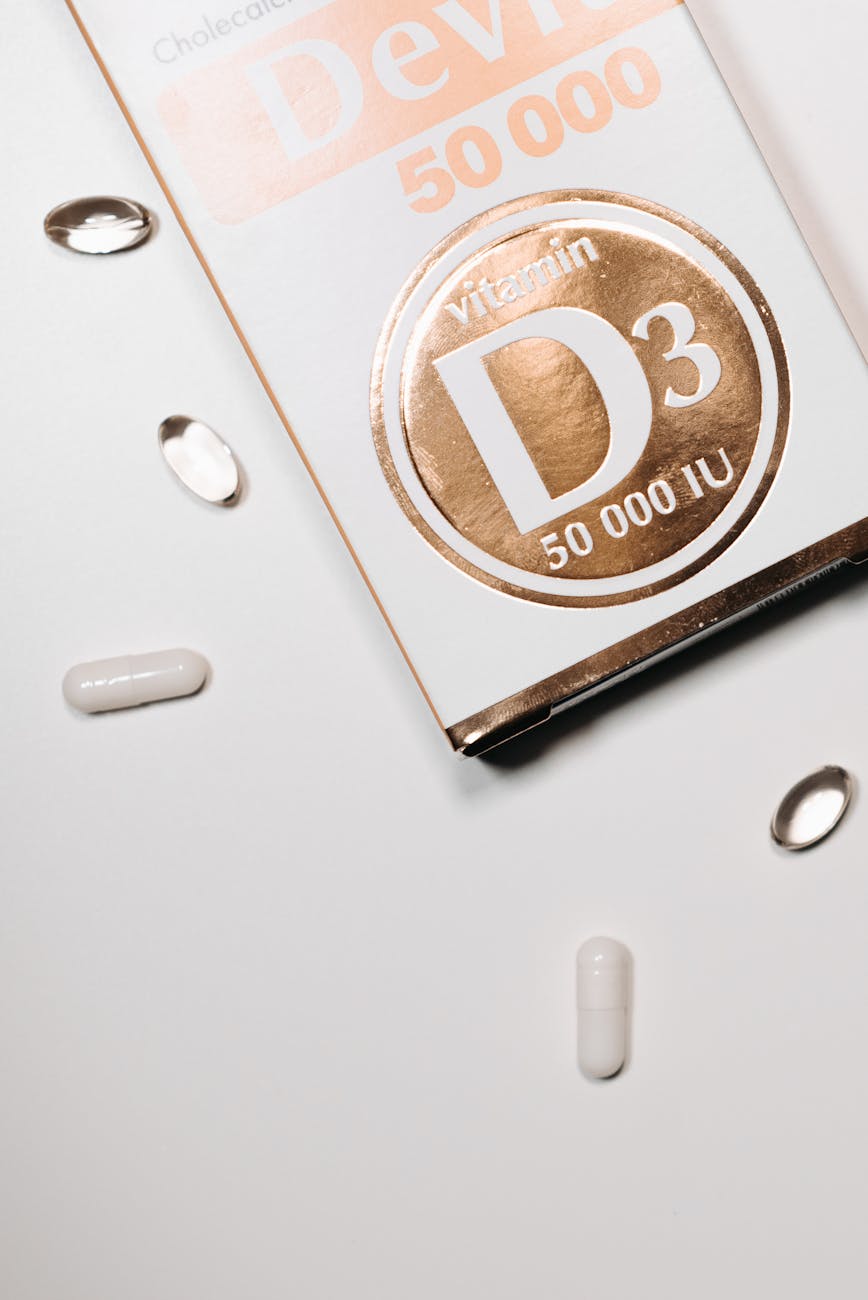Vitamin D supplement capsules and bottle