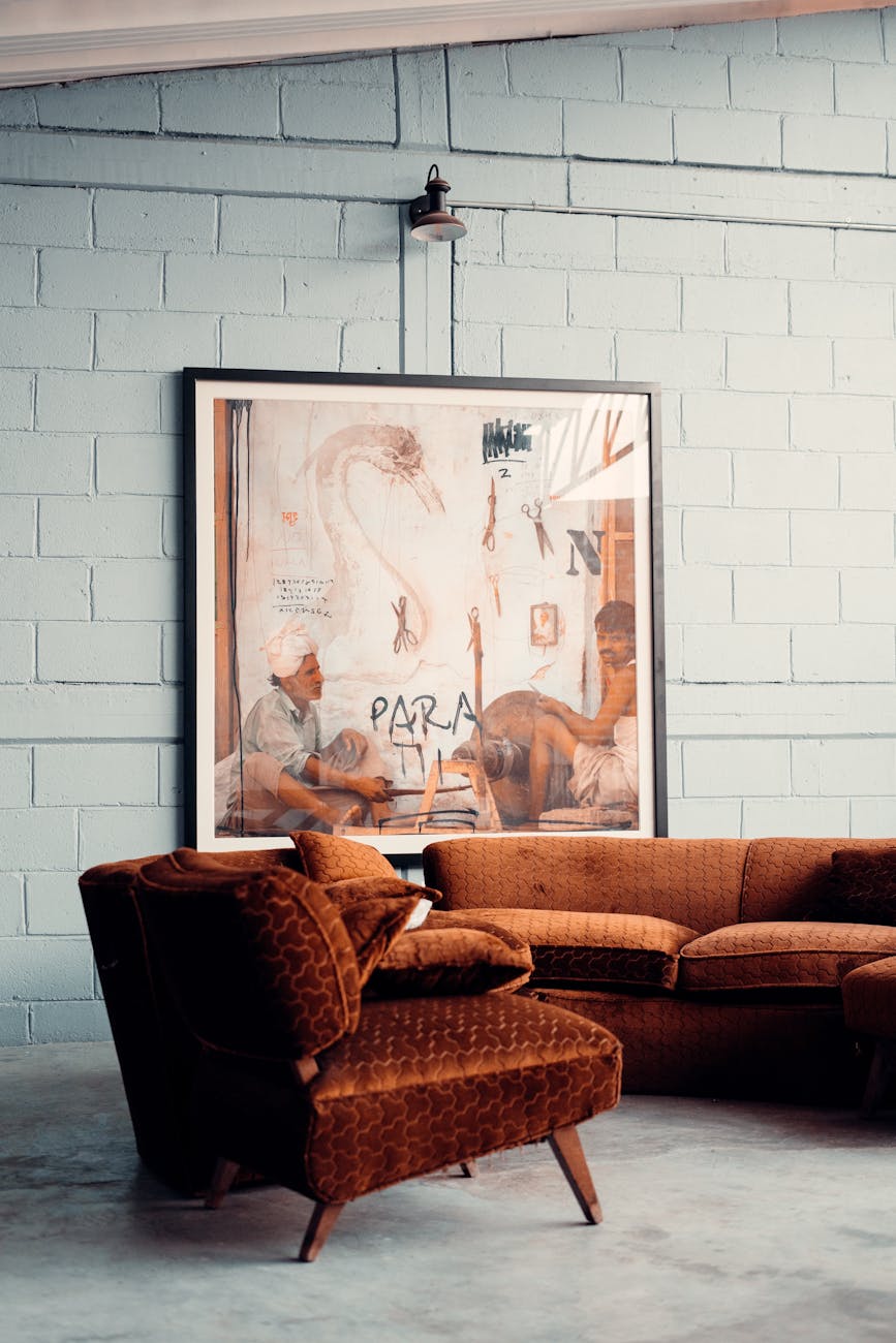 Cozy living room with art and layered furniture, chosen to reflect Australia's move beyond plain white walls