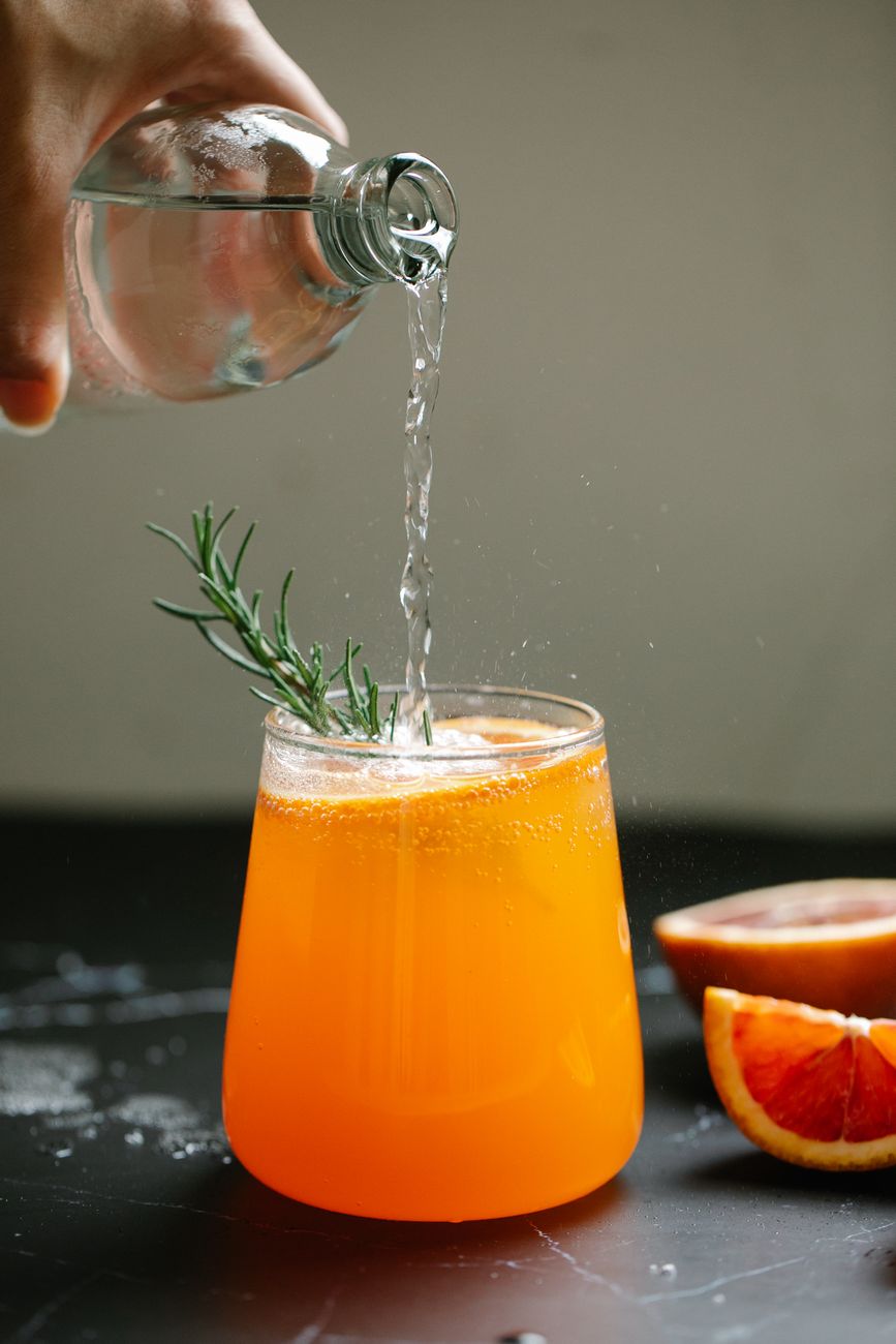 Glass of citrus mocktail on a table
